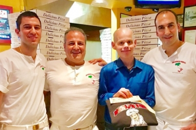 Cancer Patient donates winning prize of year worth pizza