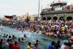 Indians in kumbh mela 2019, varanasi, kumbh mela 2019 indian diaspora takes dip in holy water at sangam, Uttar pradesh chief minister